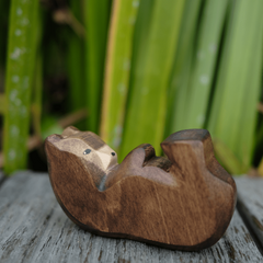 HolzWald bear cub lying
